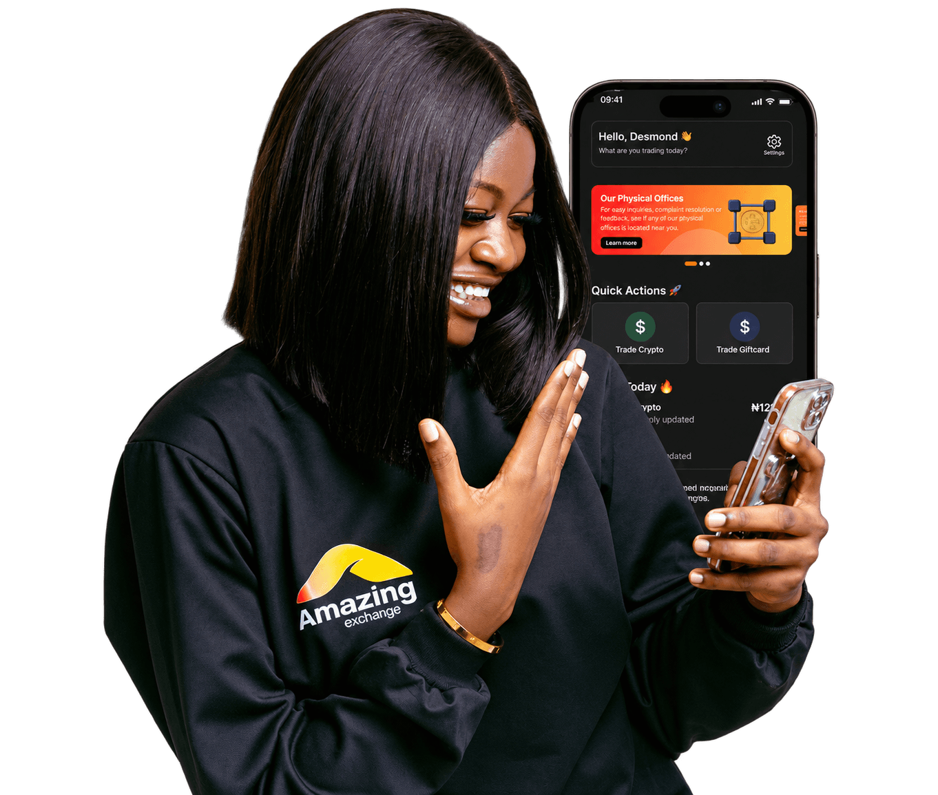 Smiling woman wearing an Amazing Exchange shirt, holding a phone showing the Amazing Exchange app